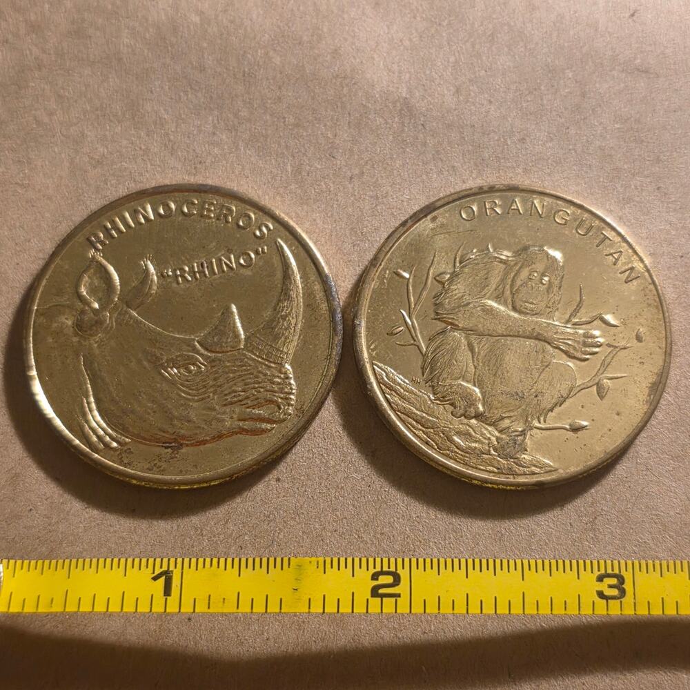 Indianapolis Zoo Souvenir Coins Rhino Orangutan Gold Tone Tokens Lot of 2